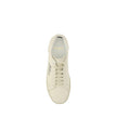 White Rubber Low Top SneakersCotton Sneakers by Saint Laurent, round toe, lace-up front closure, crater-effect flat sole, iconic brand signature embroidered in contrast on outer side panel. Season: AW25 Composition: SOLE 100% Rubber UPPER 100% Cotton MADE