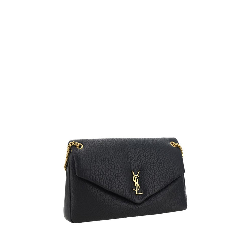 Black Lamb Ovis Aries Aries Shoulder BagThe lambskin Calypso Shoulder Bag by Saint Laurent is an elegant and contemporary accessory. Featuring a magnetic flap closure on the front, it is embellished with a three-dimensional plaque with the brand’s iconic