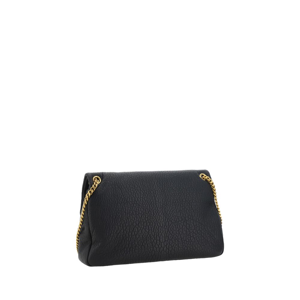 Black Lamb Ovis Aries Aries Shoulder BagThe lambskin Calypso Shoulder Bag by Saint Laurent is an elegant and contemporary accessory. Featuring a magnetic flap closure on the front, it is embellished with a three-dimensional plaque with the brand’s iconic