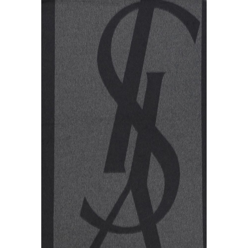 Gray Silk ScarfSaint Laurent’s Cassandre Scarf is made of pure silk and embellished with the iconic contrasting YSL logo. Featuring frayed hems, it has an elongated and elegant format (50 x 215 cm), ideal for adding a distinctive touch to any look. Season