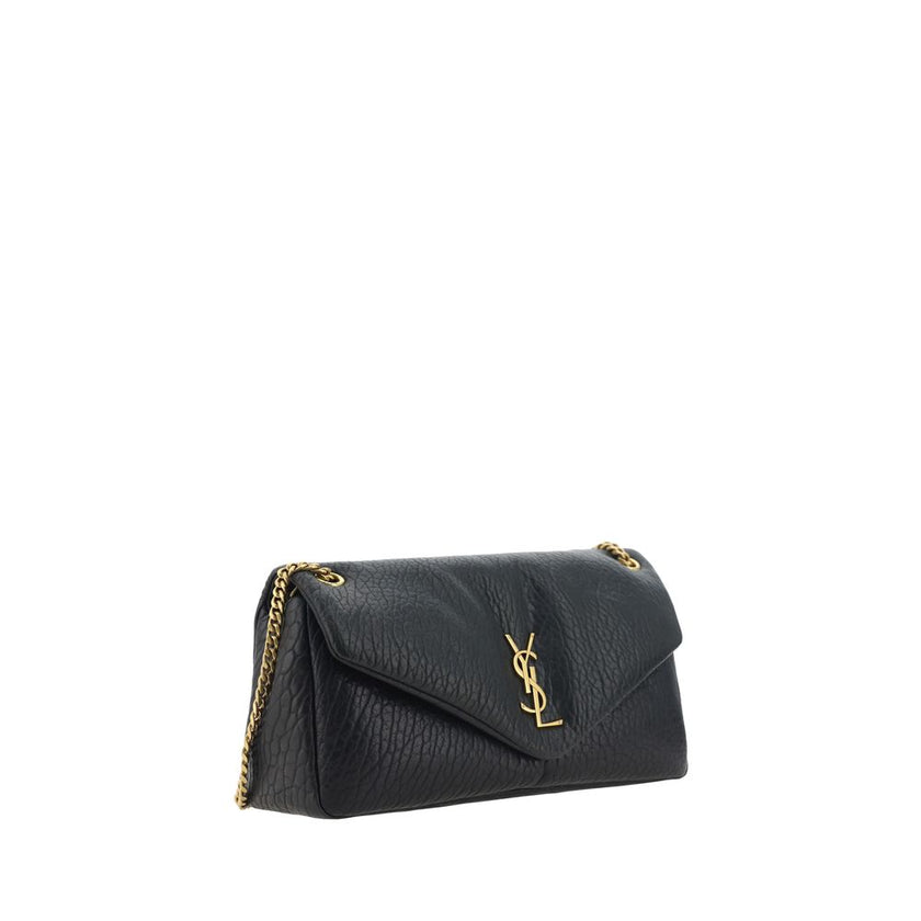 Black Lamb Ovis Aries Aries Shoulder BagSaint Laurent’s Calypso Lambskin Shoulder Bag is an elegant and sophisticated accessory. The grained leather design is enhanced by the iconic YSL logo plaque embossed on the front, while the front closure with magne