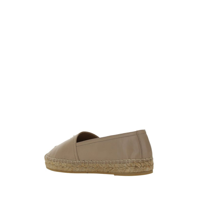 Brown Lamb Ovis Aries Aries EspadrillesLambskin Espadrilles by Saint Laurent, flat sole with rope detail, elongated toe, slip-on style, iconic brand monogram tone-on-tone press-stamped on front, contrasting logo insole. Season: AW25 Composition: UPPER 100