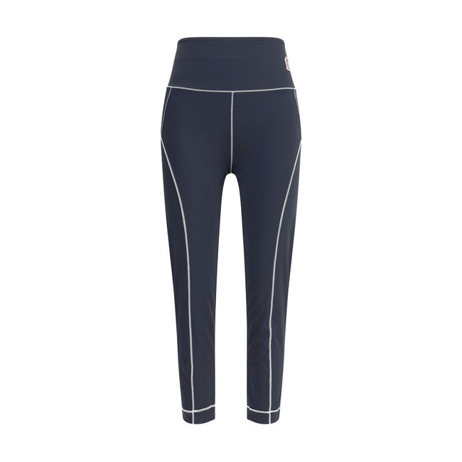 LeggingsMoncler Grenoble Leggings are designed to accompany an active lifestyle, ideal for both the gym and the trail. Made of technical fabric, they feature applied logo patches on the front and a plastic signature along the side, combining performance a