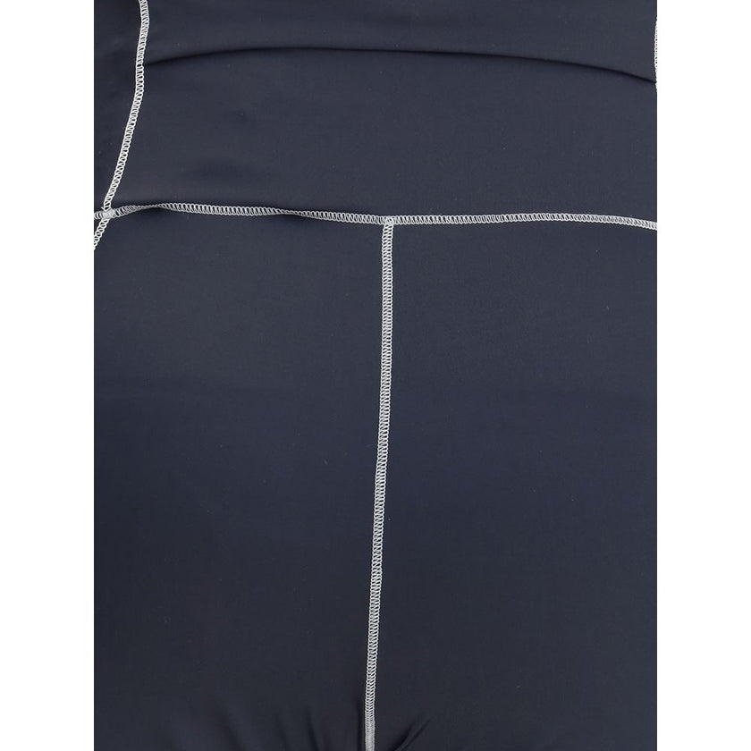 LeggingsMoncler Grenoble Leggings are designed to accompany an active lifestyle, ideal for both the gym and the trail. Made of technical fabric, they feature applied logo patches on the front and a plastic signature along the side, combining performance a