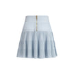 Light Blue Viscose Mini SkirtBalmain’s knit Miniskirt is distinguished by the embossed workmanship that gives structure and character to the garment. Equipped with a reinforced belt, it features a back closure with an exposed gold-metal zipper, embellishe