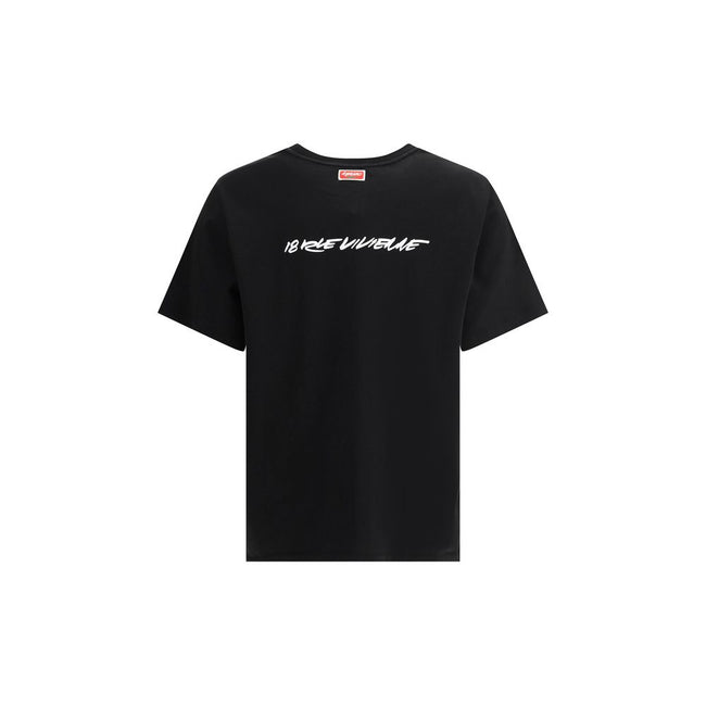 Black Cotton T-ShirtKenzo’s cotton T-Shirt is an essential garment with a strong character. Made from pure cotton, it features a ribbed crew neck that ensures comfort and durability. What makes it unique is the iconic Kenzo signature printed in contrast o