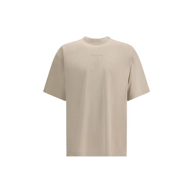 Logoed T-ShirtBalenciaga’s Logo T-Shirt features a ribbed crew neck with a distressed effect, adding a worn-in touch to the design. The iconic tone-on-tone stitched logo on the front completes the garment with understated elegance. Season: AW25 Fit: Overs