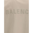Logoed T-ShirtBalenciaga’s Logo T-Shirt features a ribbed crew neck with a distressed effect, adding a worn-in touch to the design. The iconic tone-on-tone stitched logo on the front completes the garment with understated elegance. Season: AW25 Fit: Overs