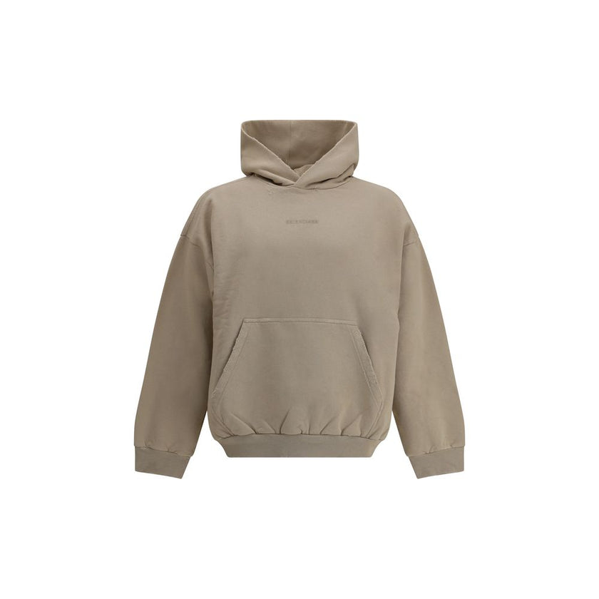 Beige Cotton SweatshirtCotton Hoodie by Balenciaga features a patch pouch pocket on the front and the iconic tone-on-tone embroidered monogram, lending a touch of understated sophistication. Ribbed cuffs and hem ensure a snug and comfortable fit. The vint