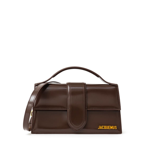 Brown Leather Le Grand Bambino HandbagJACQUEMUS Gorgeous brand new, 100% Authentic Jacquemus Le Grand Bambino light brown Bag. Model: 233BA007-3128 Color: Midnight Brown with Gold Hardware Material: Leather – Adjustable shoulder strap – Small handle – Rem