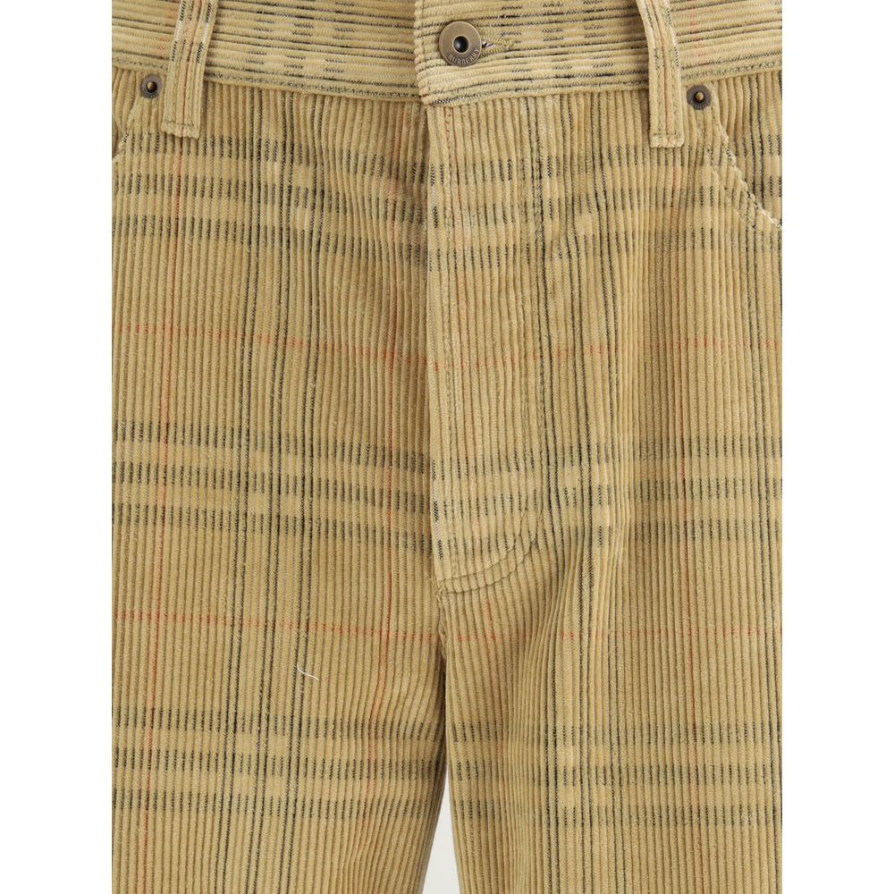Brown Cotton Casual PantsBurberry cotton Pants with a velvet ribbed design, embellished with the iconic Archivio Check motif. Five-pocket model, front button fastening and belt loops at the waist. The garment is completed by a logo leather patch applied o