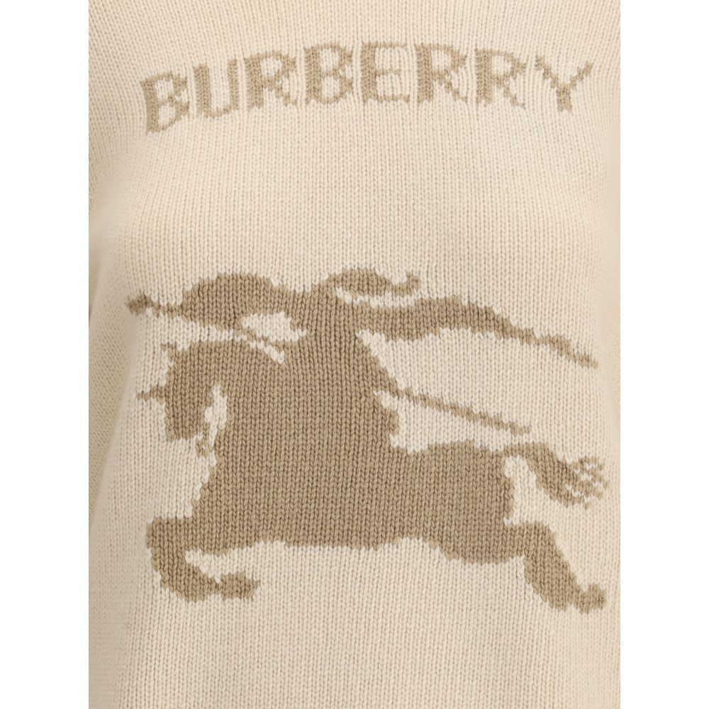 Beige Wool Cashmere SweaterBurberry’s Wool Sweater combines comfort and style thanks to its cashmere and heavy wool fabrication, with a regular fit that ensures comfort. Knit, the garment features the distinctive logo along with the famous Equestrian Knig
