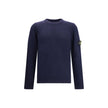 Logoed SweaterWool Sweater by Stone Island featuring a ribbed crew neck, a logo patch applied to the left sleeve and ribbed trim at the cuffs and hem. The monochrome design enhances the clean lines of the garment, perfect for a casual yet polished look. S