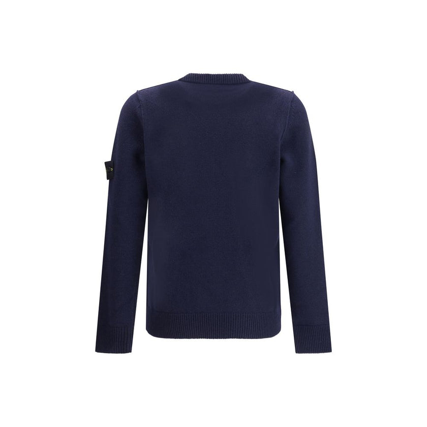 Logoed SweaterWool Sweater by Stone Island featuring a ribbed crew neck, a logo patch applied to the left sleeve and ribbed trim at the cuffs and hem. The monochrome design enhances the clean lines of the garment, perfect for a casual yet polished look. S