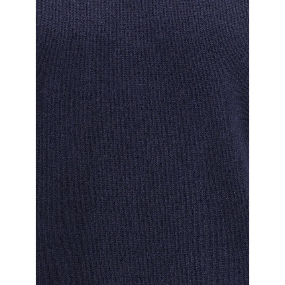 Logoed SweaterWool Sweater by Stone Island featuring a ribbed crew neck, a logo patch applied to the left sleeve and ribbed trim at the cuffs and hem. The monochrome design enhances the clean lines of the garment, perfect for a casual yet polished look. S