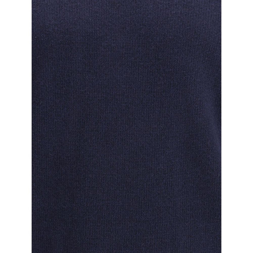 Logoed SweaterWool Sweater by Stone Island featuring a ribbed crew neck, a logo patch applied to the left sleeve and ribbed trim at the cuffs and hem. The monochrome design enhances the clean lines of the garment, perfect for a casual yet polished look. S