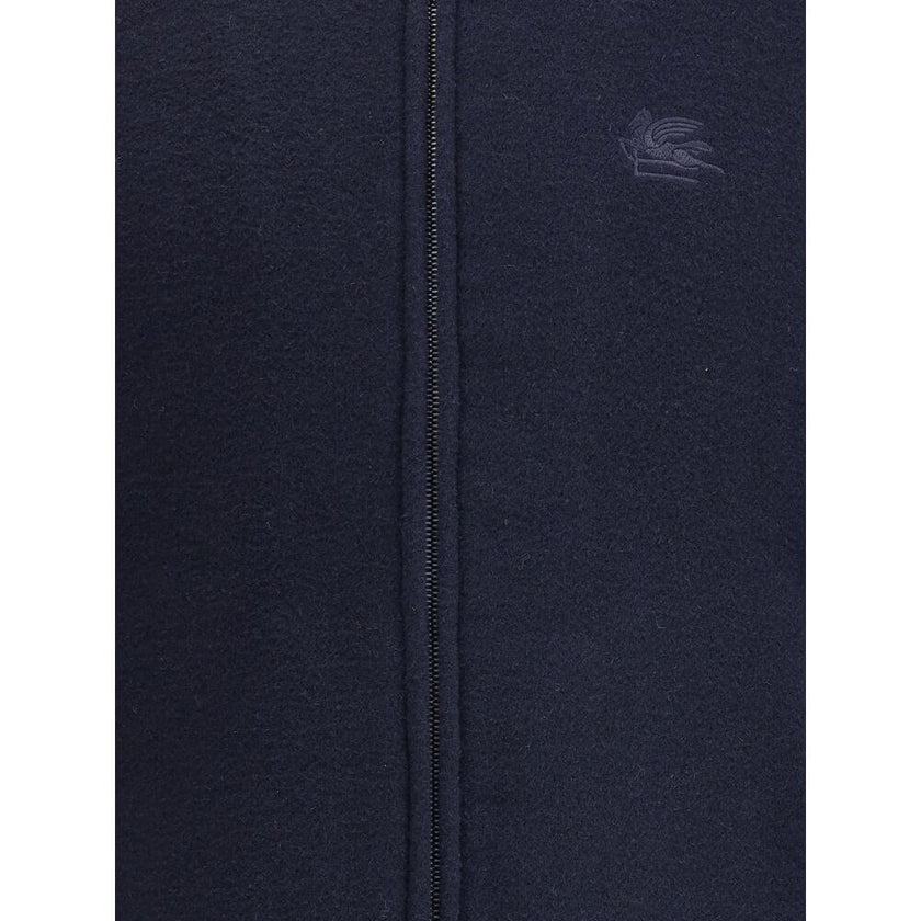 Blue Wool BomberWool bomber Jacket by Etro features a ribbed collar, cuffs and hem, and front zipper closure. The design is completed by two side welt pockets and the iconic tone-on-tone embroidered Pegasus logo on the front for a distinctive and elegant