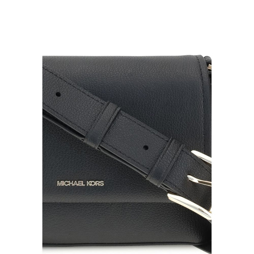 Small Nessa Shoulder BagThe small Nessa Shoulder Bag by Michael Kors combines practicality and style in a compact design. Equipped with a removable and adjustable shoulder strap, it features a flap and snap closure. The logo on the front adds a distinctiv