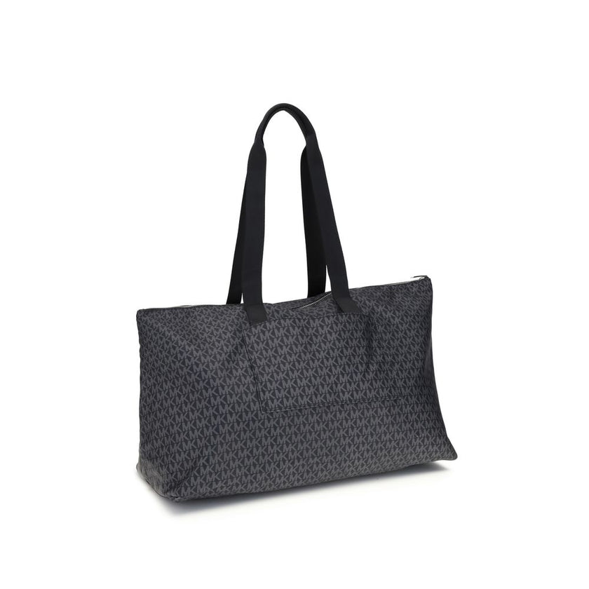 Black Polyester Shoulder BagThe Michael Kors Tanner large Tote Bag is perfect for the stylish and practical traveler. With its reversible design, it offers two looks in one: iconic logo print on one side and solid color on the other. Foldable inside itsel