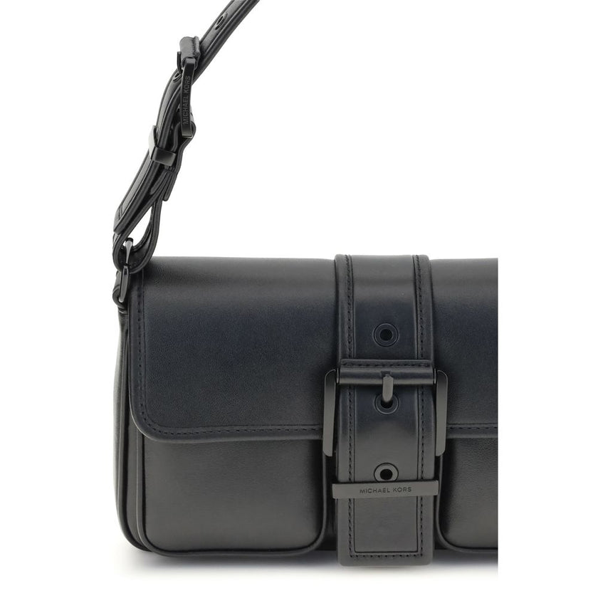 Black Calf Leather Bos Taurus Shoulder BagThe Colby medium Shoulder Bag by Michael Kors features an elegant rectangular silhouette enhanced by a bold buckle. Made of soft leather, it is perfect for carrying under the arm thanks to its flat handle. The fla