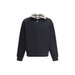 Black Cotton SweatshirtCotton Sweatshirt by Burberry featuring a classic collar and the brand’s iconic Archivio Check pattern. It features a half-length front zipper, ribbed cuffs and hem for a comfortable, finished fit. Embroidered on the front are the i