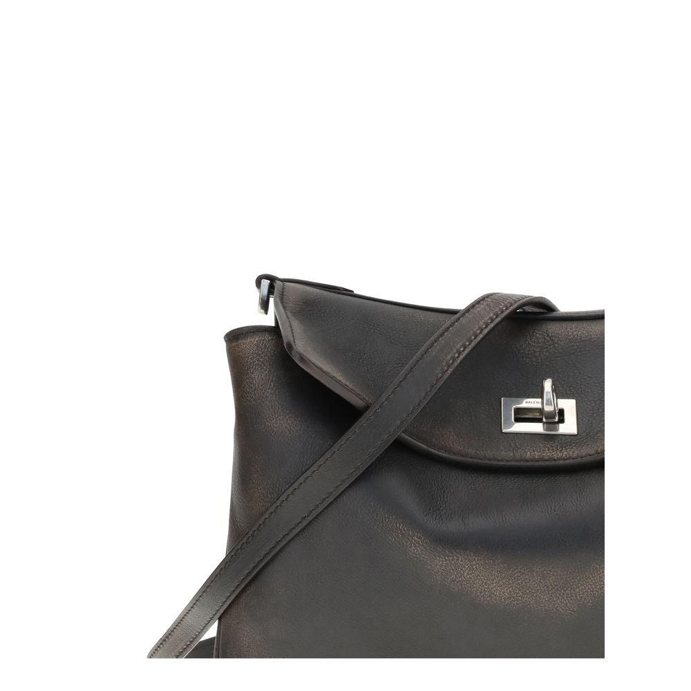 Brown Lamb Ovis Aries Aries Shoulder BagBalenciaga’s Rodeo small Shoulder Bag, designed for the modern man, is crafted from two-tone calfskin with a distressed effect, giving it a bold, contemporary feel. The messenger design is complemented by an adjusta