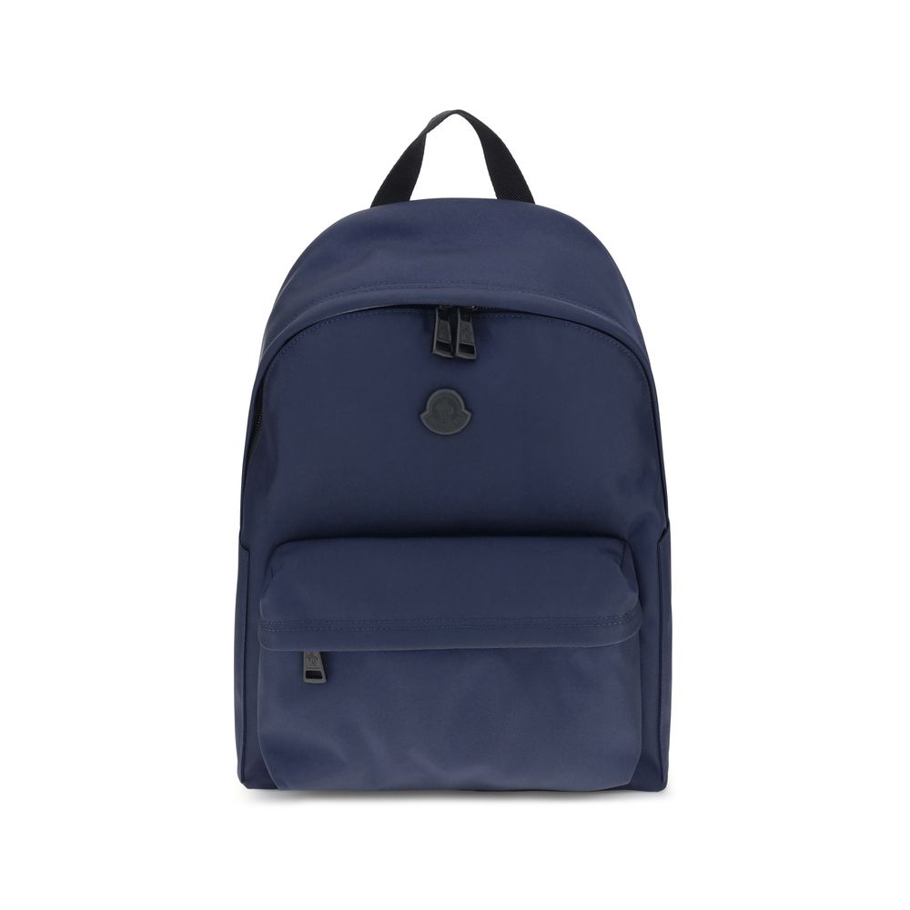 Blue Nylon BackpackMoncler’s New Pierrick Backpack is made of water-repellent nylon, with a lining of the same material for durability and protection from the elements. It features leather trim and a smooth leather handle for a touch of elegance. Adjustab