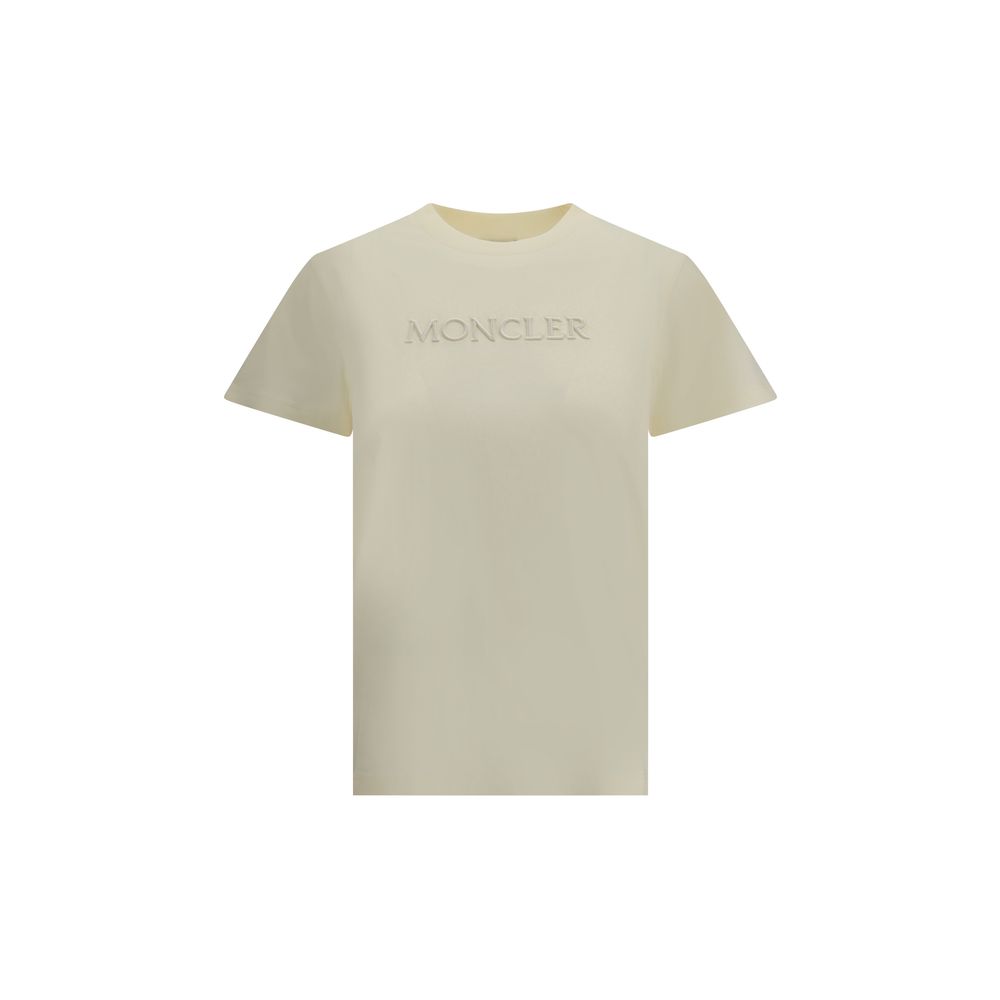 Cream Cotton T-ShirtSoft cotton T-Shirt by Moncler designed for an essential and refined look. The design features a ribbed crew neck that ensures comfort and an impeccable fit. On the front, the iconic Moncler monogram is tone-on-tone embroidered for a d