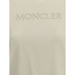 Cream Cotton T-ShirtSoft cotton T-Shirt by Moncler designed for an essential and refined look. The design features a ribbed crew neck that ensures comfort and an impeccable fit. On the front, the iconic Moncler monogram is tone-on-tone embroidered for a d