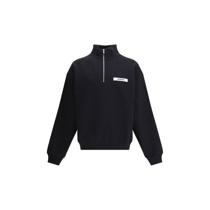 Le Camionneur SweatshirtThe cotton Le Camionneur Sweatshirt by Jacquemus features a plush interior for optimal comfort. The brand’s iconic monogram patch applied to the front adds a distinctive touch, while the ribbed cuffs and hem ensure a comfortable, f