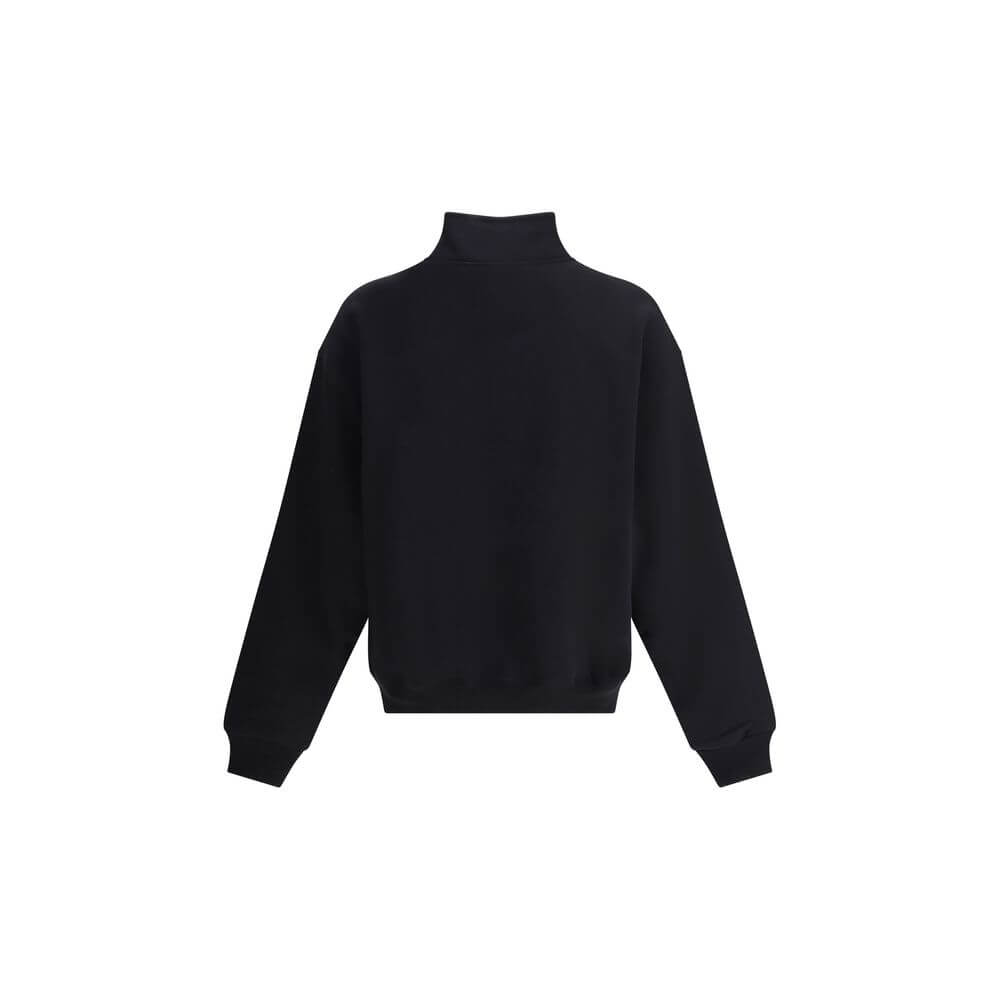 Le Camionneur SweatshirtThe cotton Le Camionneur Sweatshirt by Jacquemus features a plush interior for optimal comfort. The brand’s iconic monogram patch applied to the front adds a distinctive touch, while the ribbed cuffs and hem ensure a comfortable, f