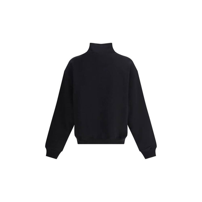 Le Camionneur SweatshirtThe cotton Le Camionneur Sweatshirt by Jacquemus features a plush interior for optimal comfort. The brand’s iconic monogram patch applied to the front adds a distinctive touch, while the ribbed cuffs and hem ensure a comfortable, f