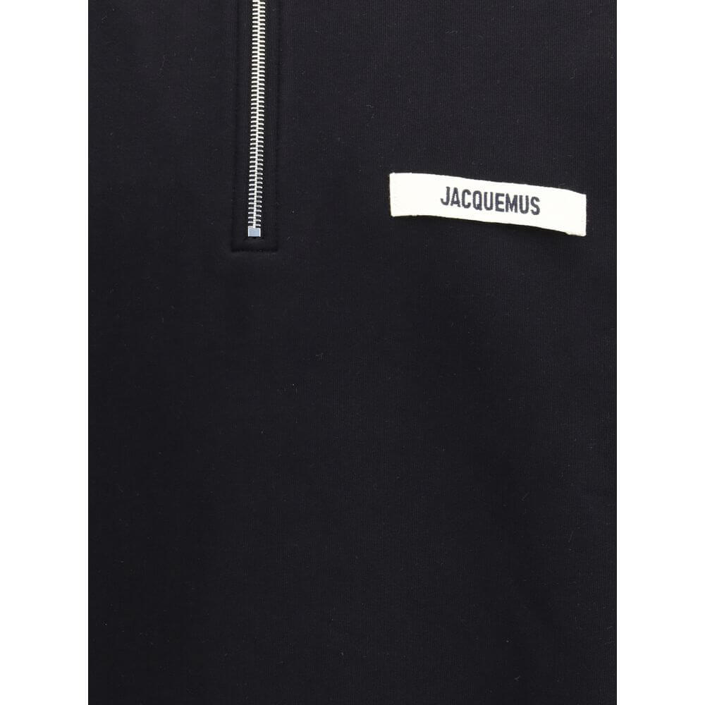 Le Camionneur SweatshirtThe cotton Le Camionneur Sweatshirt by Jacquemus features a plush interior for optimal comfort. The brand’s iconic monogram patch applied to the front adds a distinctive touch, while the ribbed cuffs and hem ensure a comfortable, f