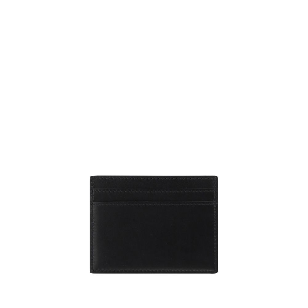Black Calf Leather Bos Taurus WalletCalfskin Card Holder by Saint Laurent, card slots on front and back, iconic brand monogram pressure-stamped on front. Season: AW25 Dimension: 10x10x0.5 Composition: 100% Calf Leather Bos Taurus MADE IN ITALYBlack Calf L