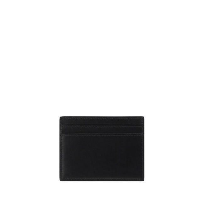 Black Calf Leather Bos Taurus WalletCalfskin Card Holder by Saint Laurent, card slots on front and back, iconic brand monogram pressure-stamped on front. Season: AW25 Dimension: 10x10x0.5 Composition: 100% Calf Leather Bos Taurus MADE IN ITALYBlack Calf L