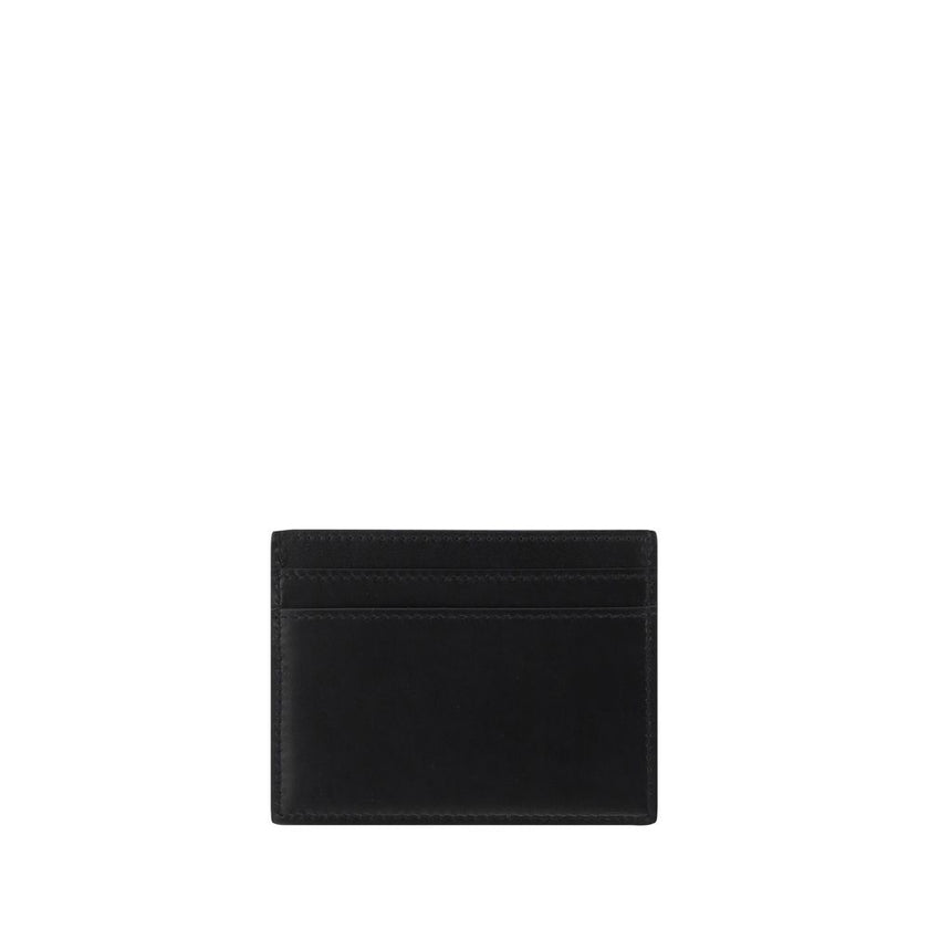 Black Calf Leather Bos Taurus WalletCalfskin Card Holder by Saint Laurent, card slots on front and back, iconic brand monogram pressure-stamped on front. Season: AW25 Dimension: 10x10x0.5 Composition: 100% Calf Leather Bos Taurus MADE IN ITALYBlack Calf L