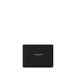 Black Calf Leather Bos Taurus WalletLeather Grain De Poudre Credit Card Holder from Saint Laurent, two slots card on front and back, one open pocket for coins, embossed brand logo on front. Season: AW25 Dimension: 10×10 Composition: 100% Calf Leather Bos