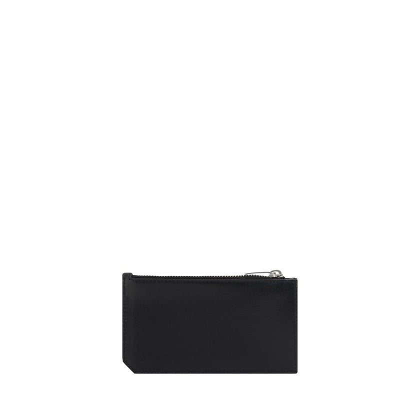 Black Calf Leather Bos Taurus WalletCalfskin Card Holder by Saint Laurent, three-dimensional iconic YSL logo plaque on front, card slot on front, top zipper closure. Season: AW25 Dimension: 13×13 Composition: 100% Calf Leather Bos Taurus MADE IN ITALYBlac