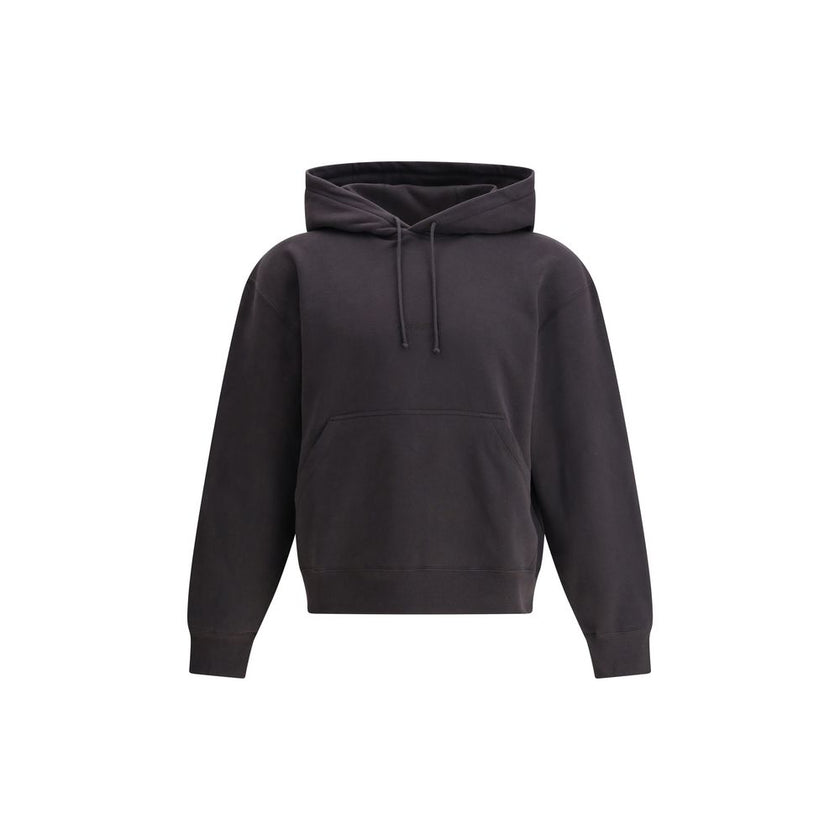 Black Cotton SweatshirtThe Saint Laurent Hoodie is a garment that combines comfort and urban style, with a simple yet refined design. The adjustable drawstring hood offers functionality and the possibility of customizing the fit, while the kangaroo pocket