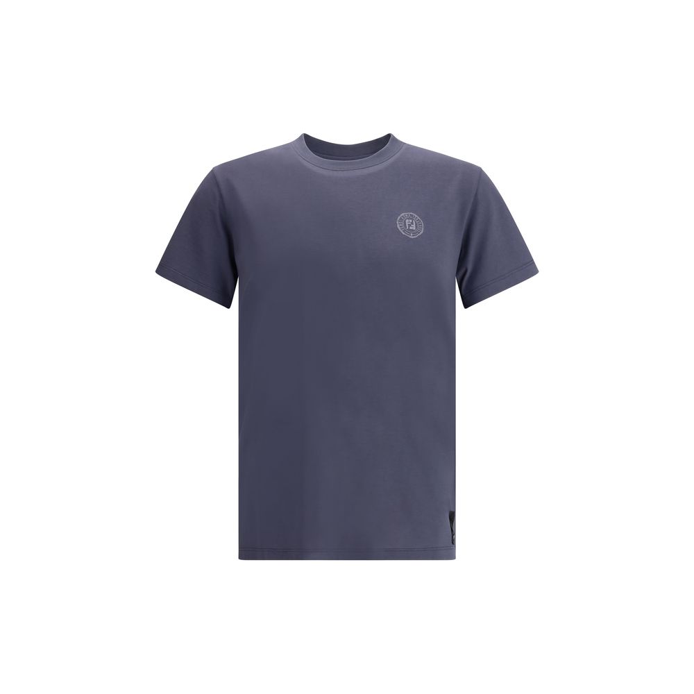 Blue Cotton T-ShirtFendi’s cotton T-Shirt is a casual garment with a strong character. Made from soft cotton, it features a ribbed crew neck and the iconic logo printed on the front for an essential yet instantly recognizable look. Season: AW25 Fit: Regul