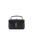 Black Calf Leather Bos Taurus WalletSaint Laurent signature leather Shoulder Bag, an accessory that combines elegance and functionality. The front closure with magnetic flap is enriched by the plaque detail with the iconic embossed YSL logo, a symbol of t