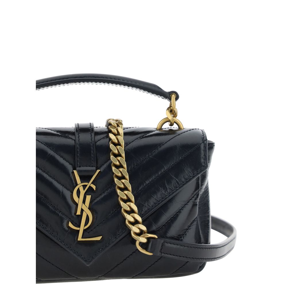 Black Calf Leather Bos Taurus WalletSaint Laurent signature leather Shoulder Bag, an accessory that combines elegance and functionality. The front closure with magnetic flap is enriched by the plaque detail with the iconic embossed YSL logo, a symbol of t