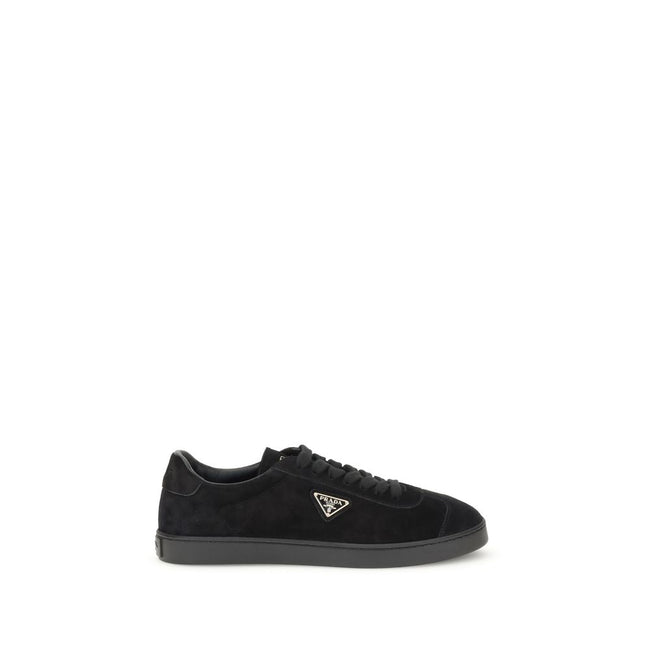 Black Calf Leather Bos Taurus Low Top SneakersPrada’s suede Sneakers combine contemporary style with everyday comfort. Featuring a flat rubber sole and round toe, they are distinguished by the iconic triangular side-applied plaque and tone-on-tone logo on