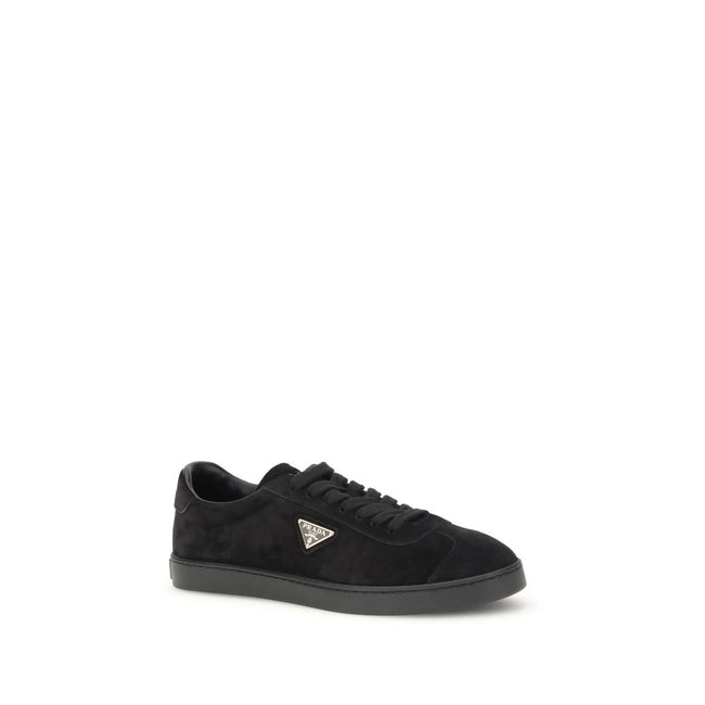 Black Calf Leather Bos Taurus Low Top SneakersPrada’s suede Sneakers combine contemporary style with everyday comfort. Featuring a flat rubber sole and round toe, they are distinguished by the iconic triangular side-applied plaque and tone-on-tone logo on