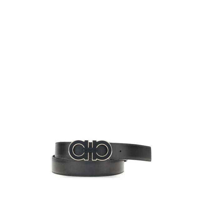 Black Calf Leather Bos Taurus Regular BeltThe Gancini Reversible Belt by Ferragamo is a contemporary reinterpretation of an iconic classic. Featuring a stitched shaft with a casual allure, it offers a reversible construction that enhances its versatility.