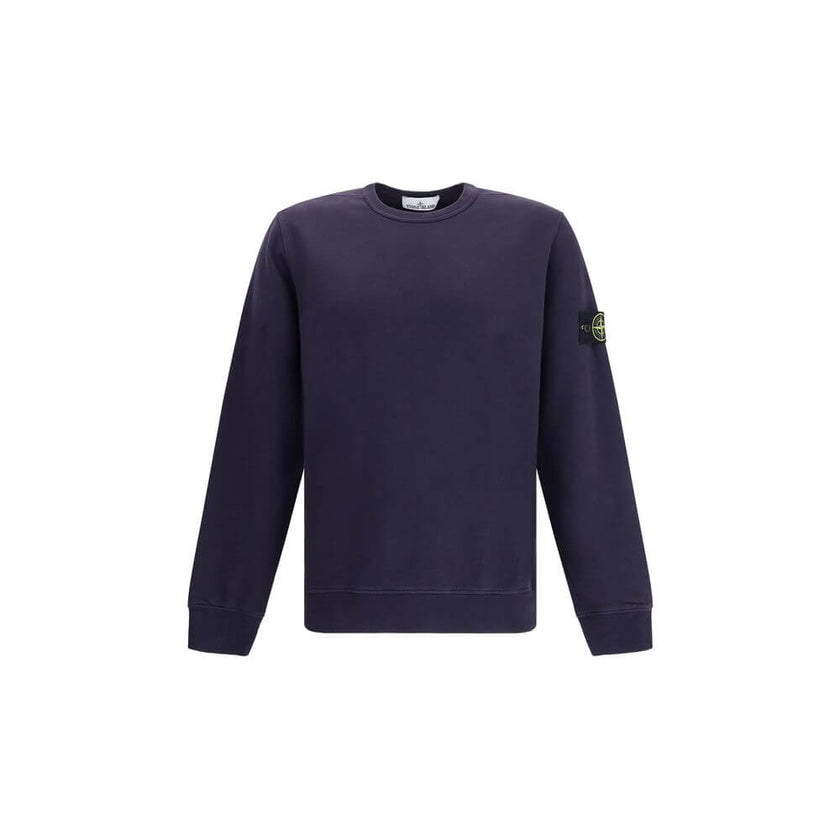 Logoed SweatshirtCotton Sweatshirt by Stone Island featuring a ribbed crew neck, a logo patch applied to the left sleeve and ribbed details on the cuffs and hem. The plush interior provides comfort and warmth, making this garment perfect for cooler days.