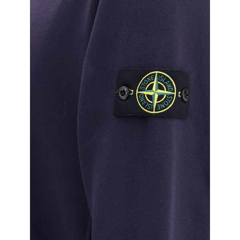 Logoed SweatshirtCotton Sweatshirt by Stone Island featuring a ribbed crew neck, a logo patch applied to the left sleeve and ribbed details on the cuffs and hem. The plush interior provides comfort and warmth, making this garment perfect for cooler days.