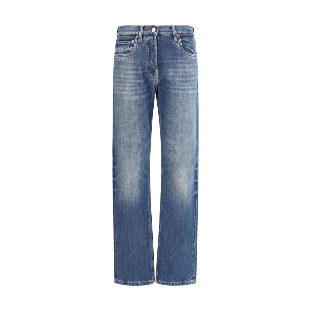 Blue Cotton Straight-Leg JeansPrada’s Straight Jeans combine classic style with distinctive details. With five-pocket styling, they feature a front zip-and-button closure, belt loops at the waist and a logo patch on the back for a touch of contemporary el