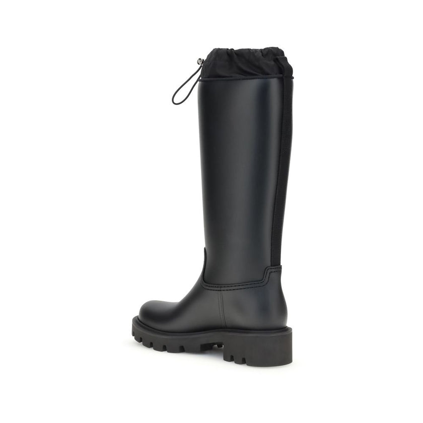 Black Pvc Rain BootsMoncler’s Kickstream High rain Boots offer technical functionality and contemporary style. Made with PVC and waterproof nylon uppers, they are complemented by a fabric footbed for comfort and a TPU welt. The EVA tread provides lightwei