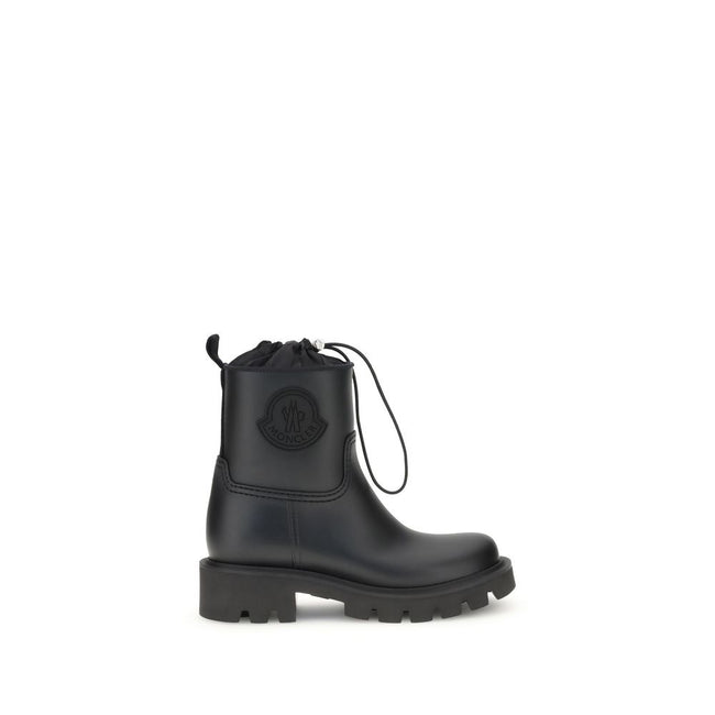 Black Rubber Lace-Up BootsMoncler’s Kickstream rubber Boots combine functionality and style with distinctive details. Featuring a round toe, they feature a tonal logo applique on the side and logo fabric inserts on the back. The drawstring closure and bac